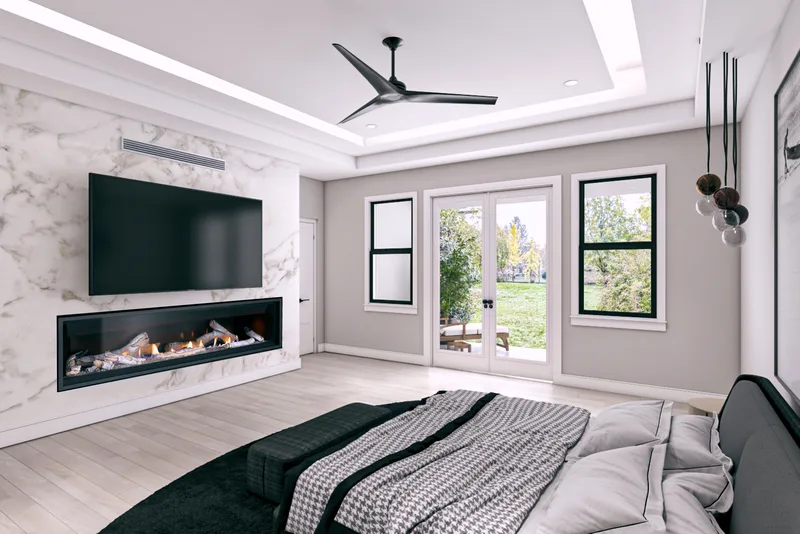 A long linear gas fireplace below a wall-mounted TV in a bedroom